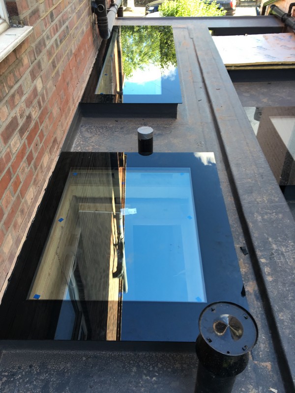 Multiple flat roof skylights on extension in Purley